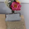 Pochette morbida metallizzata strass