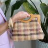 Clutch fantasia damier con manico in legno Rosa/Moro